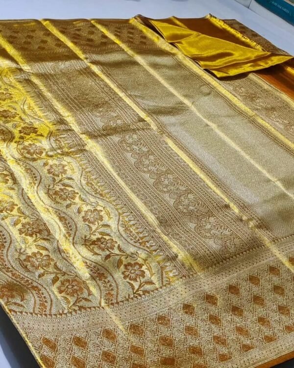 Pure kanchipattu tissue edge to edge gold with silver jari