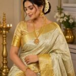 Bridal wear pure kanchipattu tissue edge to edge gold boarder with silver brocade designs