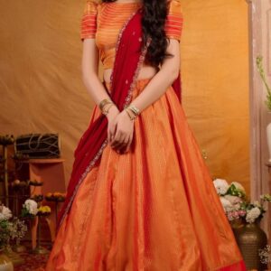 Manohari Soft Silk Orange Lehenga Set