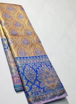 Pure Kanchipuram tissue Meenakari saree in gold and royal blue with purple floral motifs