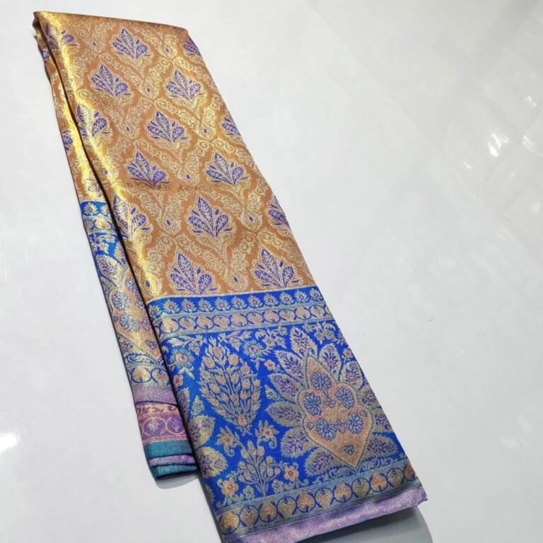Pure Kanchipuram tissue Meenakari saree in gold and royal blue with purple floral motifs