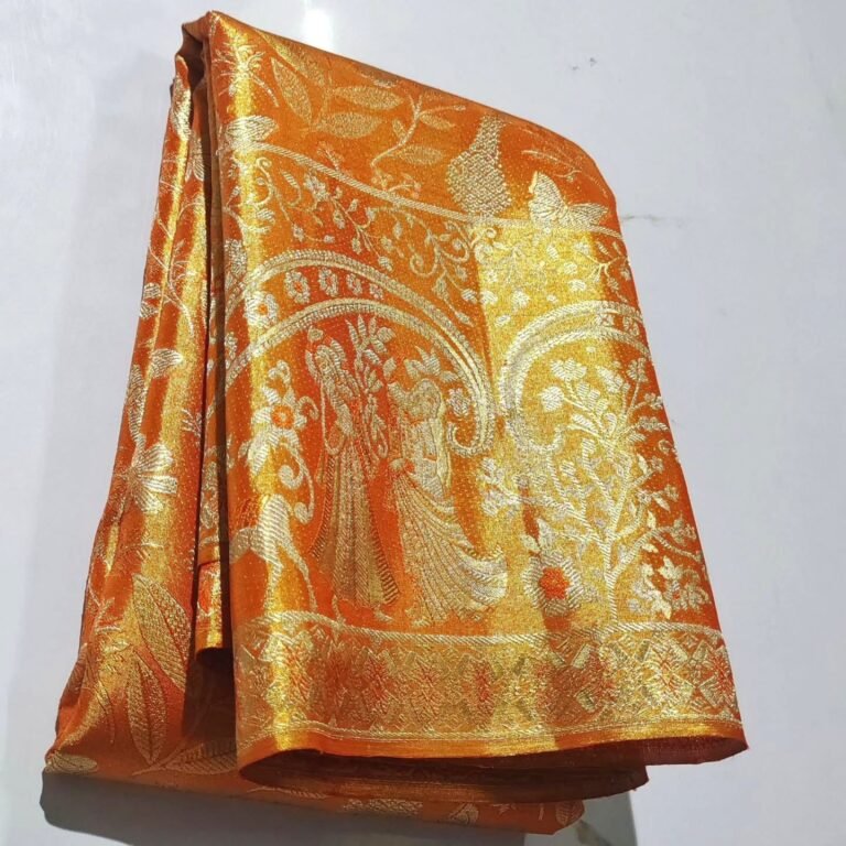 Pure Kanchipuram tissue Meena saree in orange and gold – folded view with ornate motifs