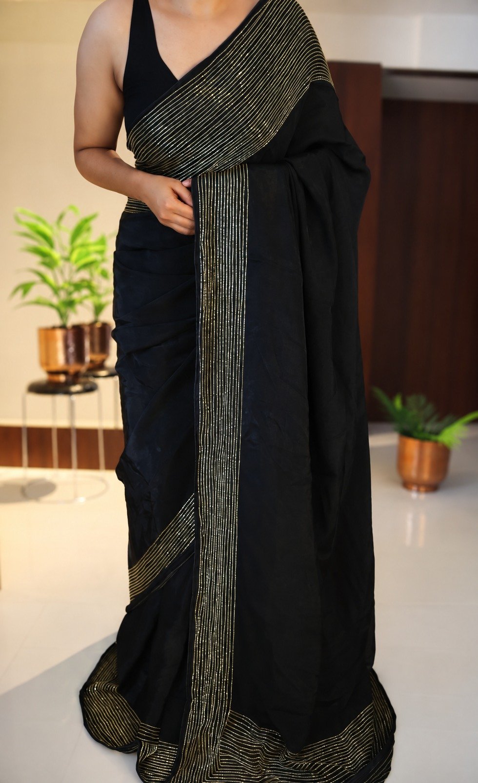 Pure Crepe Silk Saree with Cutdana Handwork 7 Black pure crepe silk saree with vertical cutdana handwork – alternate front view