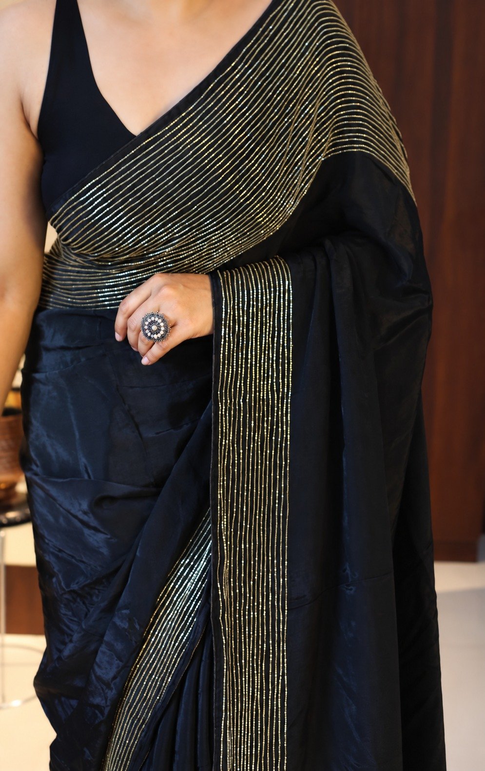 Pure Crepe Silk Saree with Cutdana Handwork 4 Black pure crepe silk saree with vertical cutdana handwork – cutdana detail