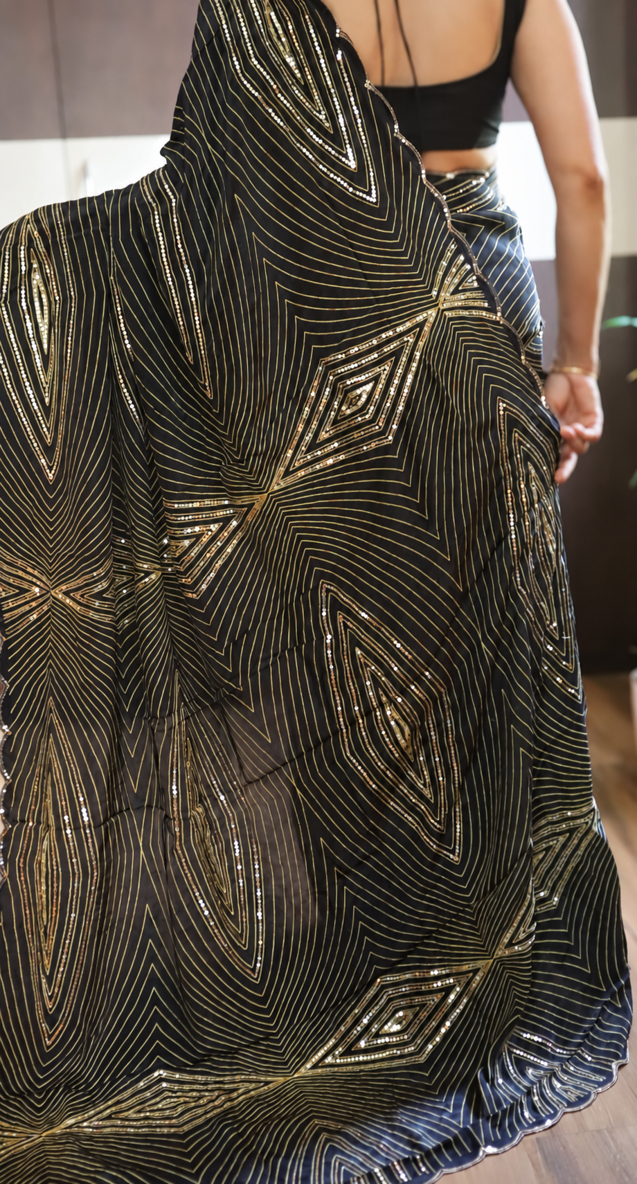 Black Pure Crepe Silk Cocktail Saree with Gold Zari and Sequins 2 Black pure crepe silk cocktail saree with gold zari geometric patterns and handwork sequins
