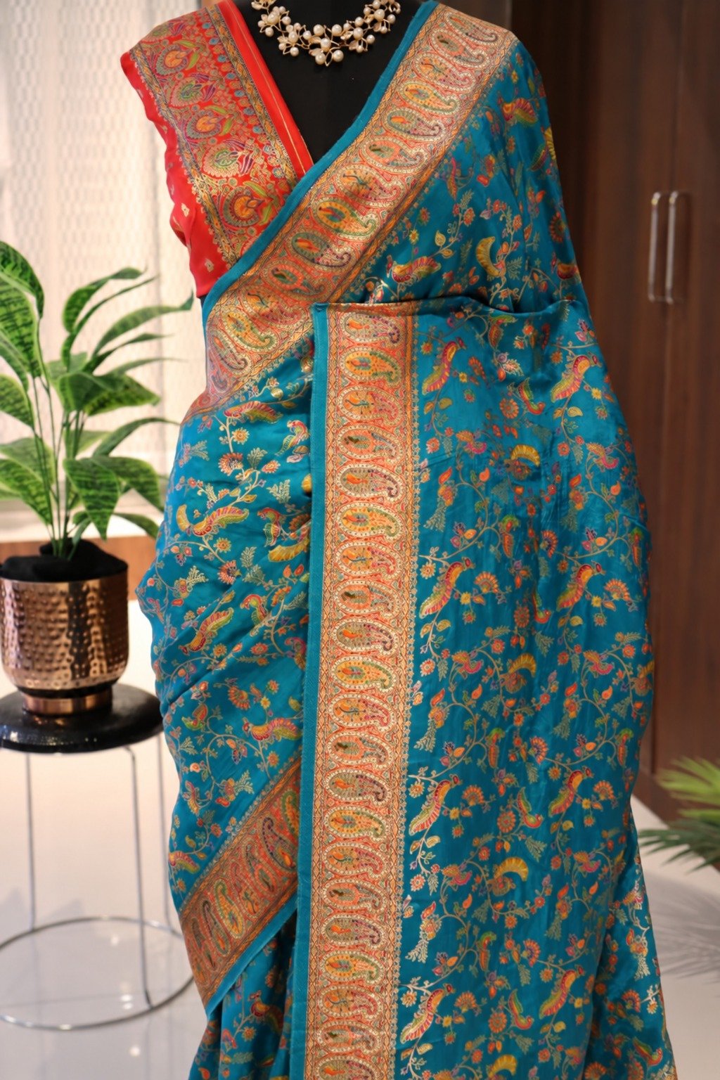 Kani Weaving Pure Munga Silk Saree with Contrast Mango Border 2 Kani weaving pure Munga silk saree in teal blue with contrast mango border – front view