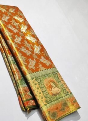 Pure Kanchipattu tissue orange and green meenakari brocade saree folded view