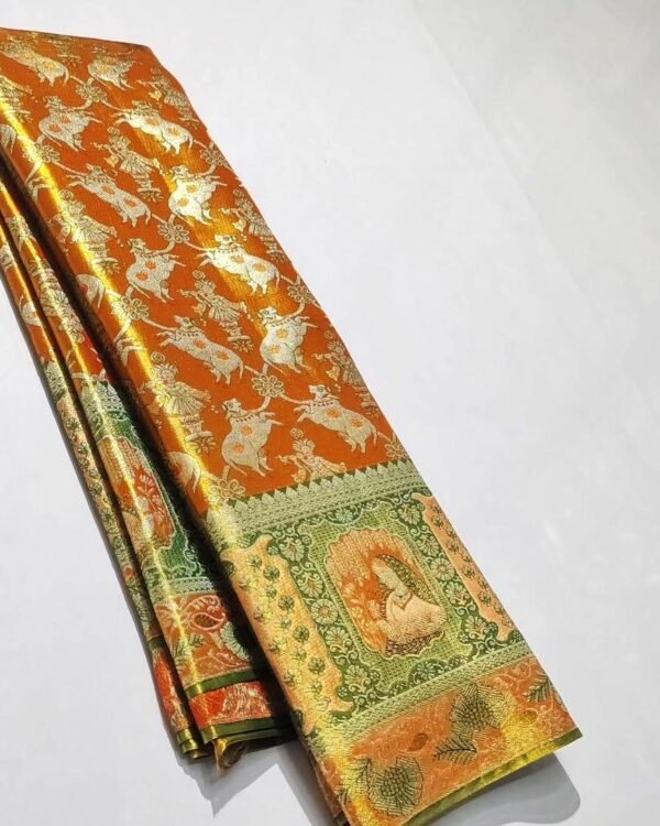 Pure Kanchipattu tissue orange and green meenakari brocade saree folded view