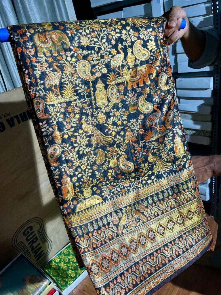 Pure Kanchipuram double warp navy blue silk saree with gold and multicolour meenakari motifs