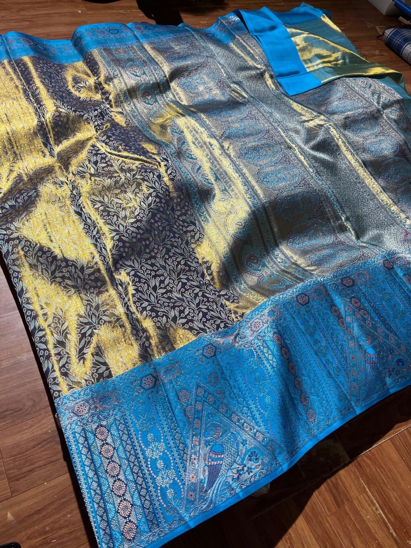 Pure Kanchipuram Resham Warp Meenakari Silk Saree – Royal Blue and Turquoise 3 Pure Kanchipuram Resham warp saree full view with royal blue floral body and turquoise border