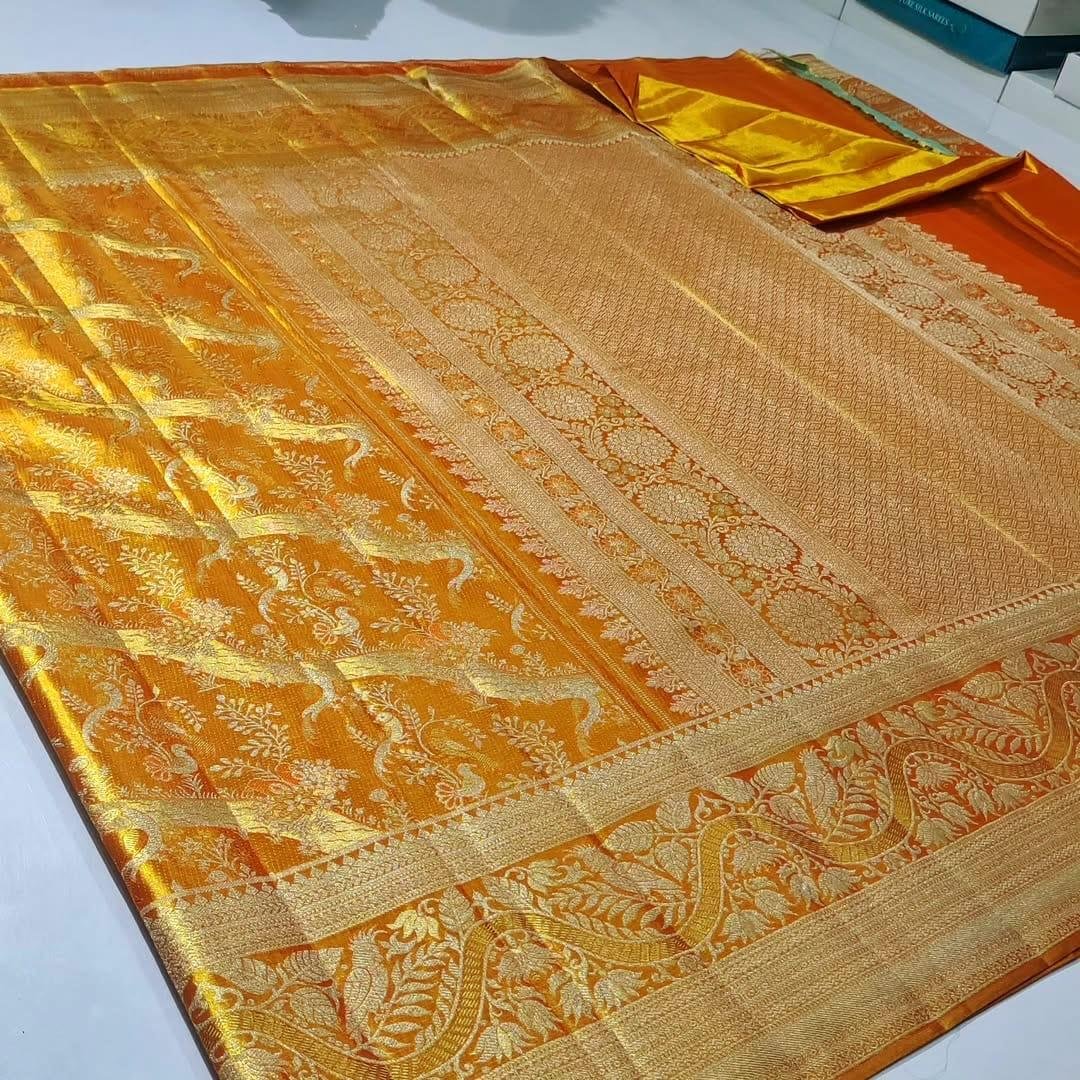 Pure Kanchipattu Tissue Silver and Gold Zari Brocade Saree – Orange 2 Pure Kanchipattu tissue orange saree with silver and gold zari brocade full view and ornate pallu