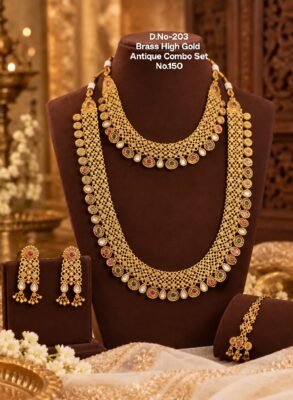 Brass antique layered necklace set Antique gold lattice links with red, green and white decorative accents.