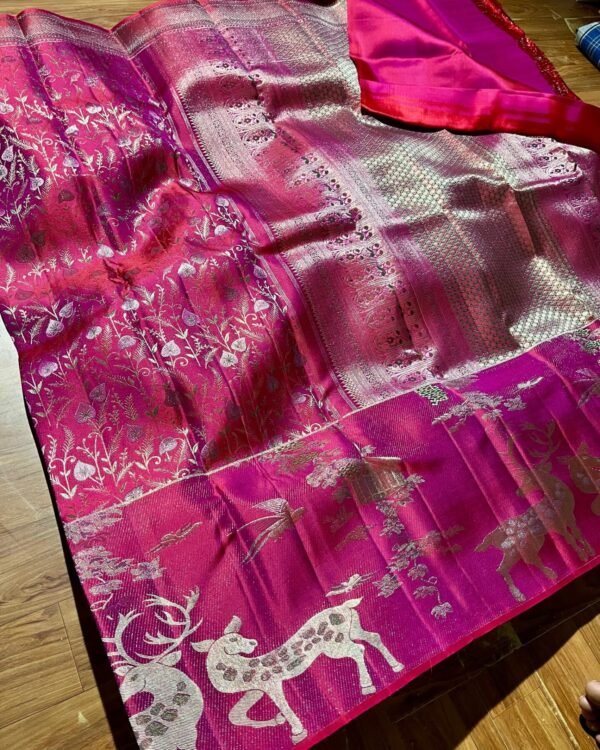 Kanchipuram Resham warp Meenakari saree in rani pink with floral weaving, animal-motif border and silver-tone pallu