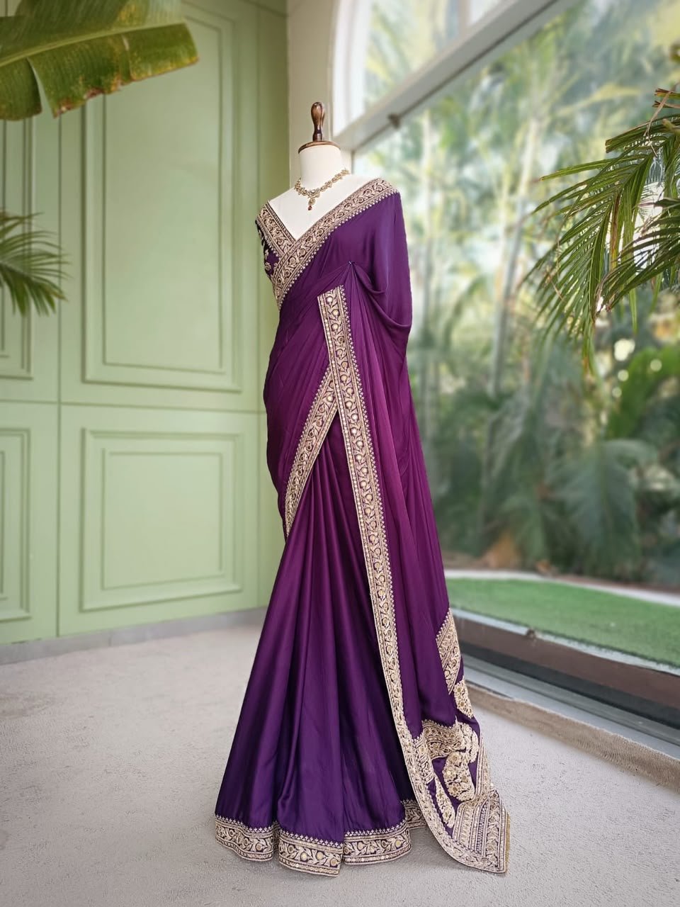 Purple Party Wear Saree with Ornate Gold-Tone Border 3 Purple party wear saree full-length view with gold-tone border