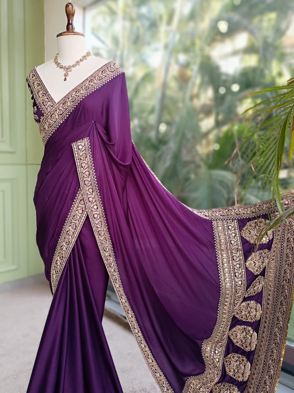 Purple Party Wear Saree with Ornate Gold-Tone Border 1 Purple party wear saree with ornate gold-tone border and decorative pallu