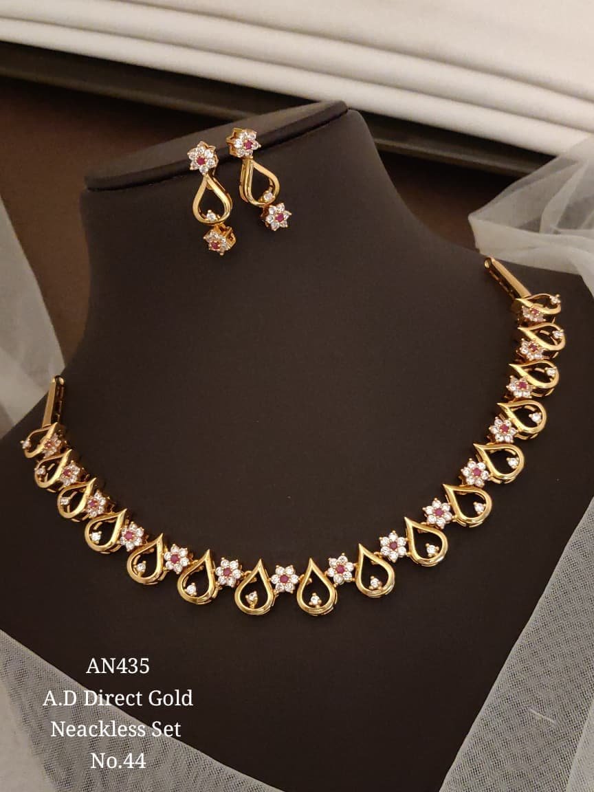 AD Pink Floral Teardrop Necklace Set 1 AD Pink Floral Teardrop Necklace Set in gold-tone finish