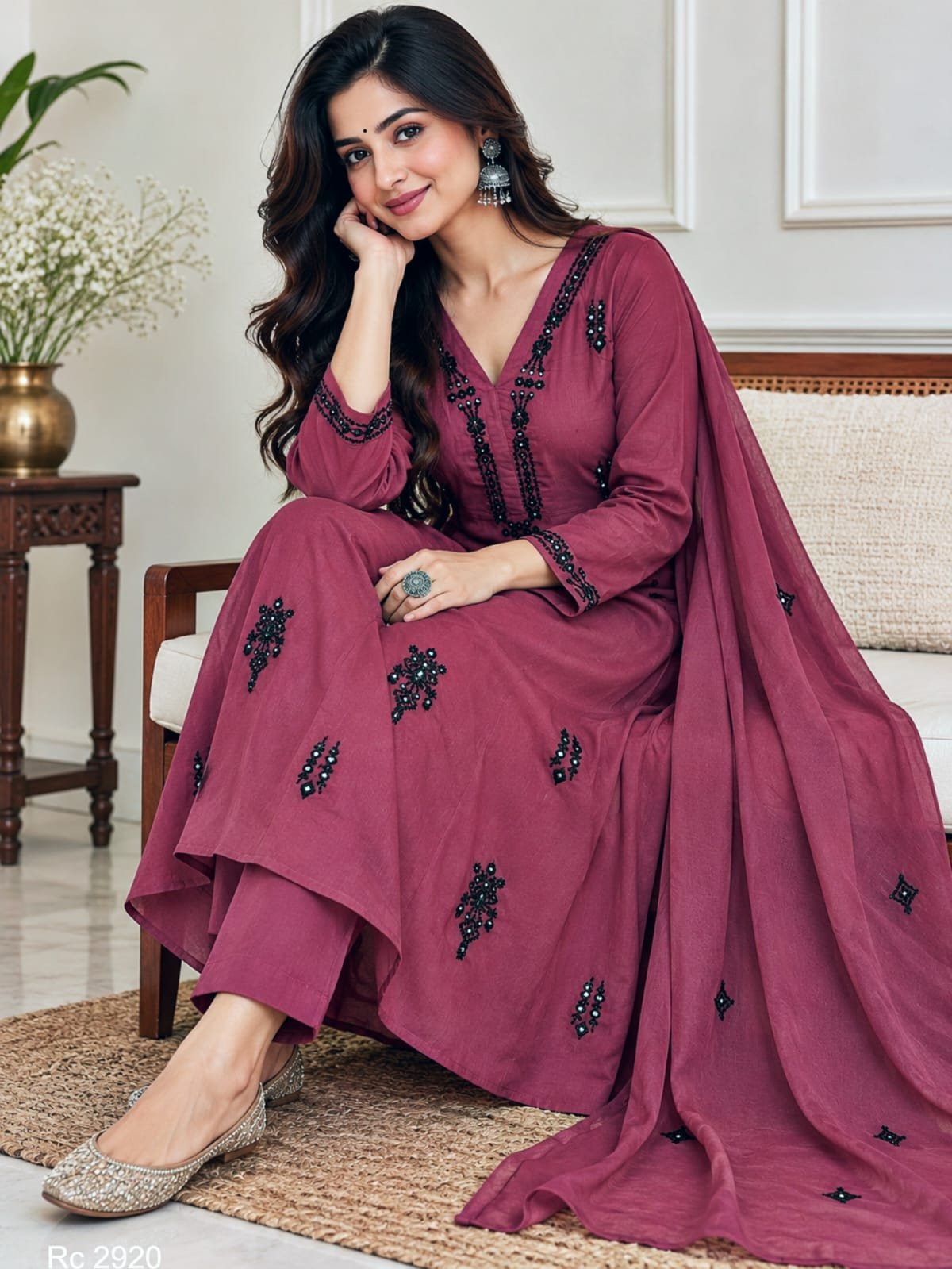 Wine Cotton A Line Embroidered Kurti Set 2 Wine cotton A line embroidered kurti set seated model view