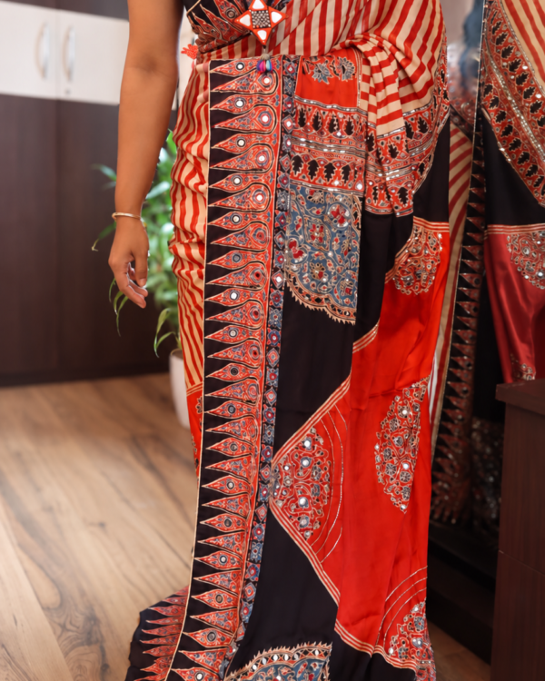 Pure Modal Ajrakh Saree with original mirrors cutdana pearl and sequin hand embroidery