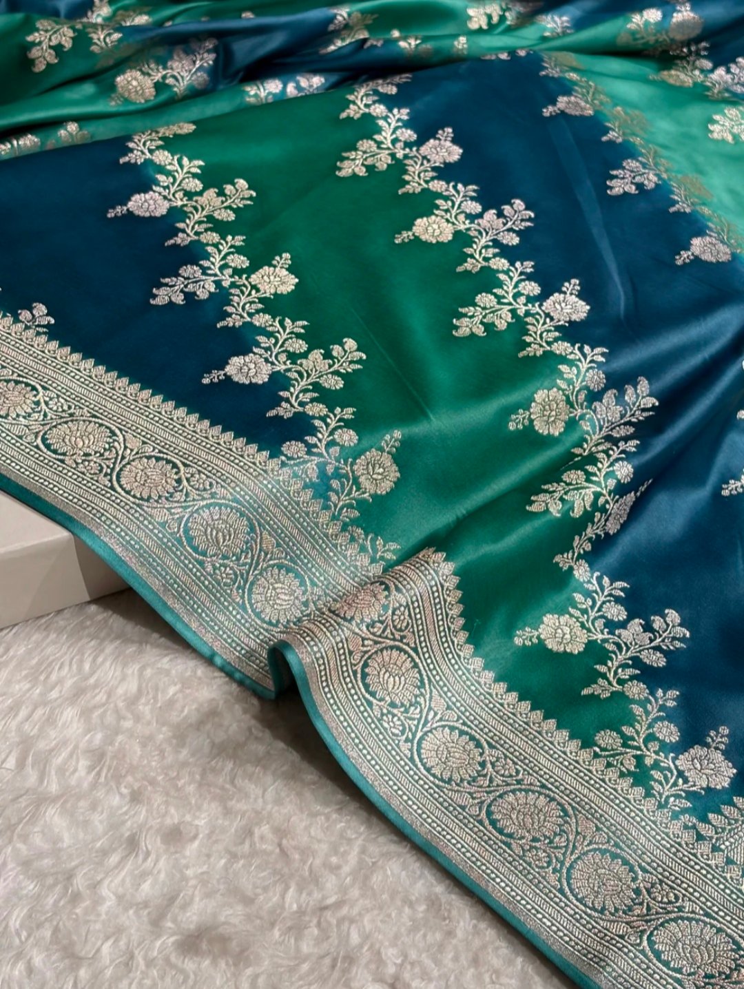Teal and Navy Blue Banarasi Mashroo Katan Silk Saree 1 Teal and Navy Blue Banarasi Mashroo Katan silk saree with Ada floral pattern