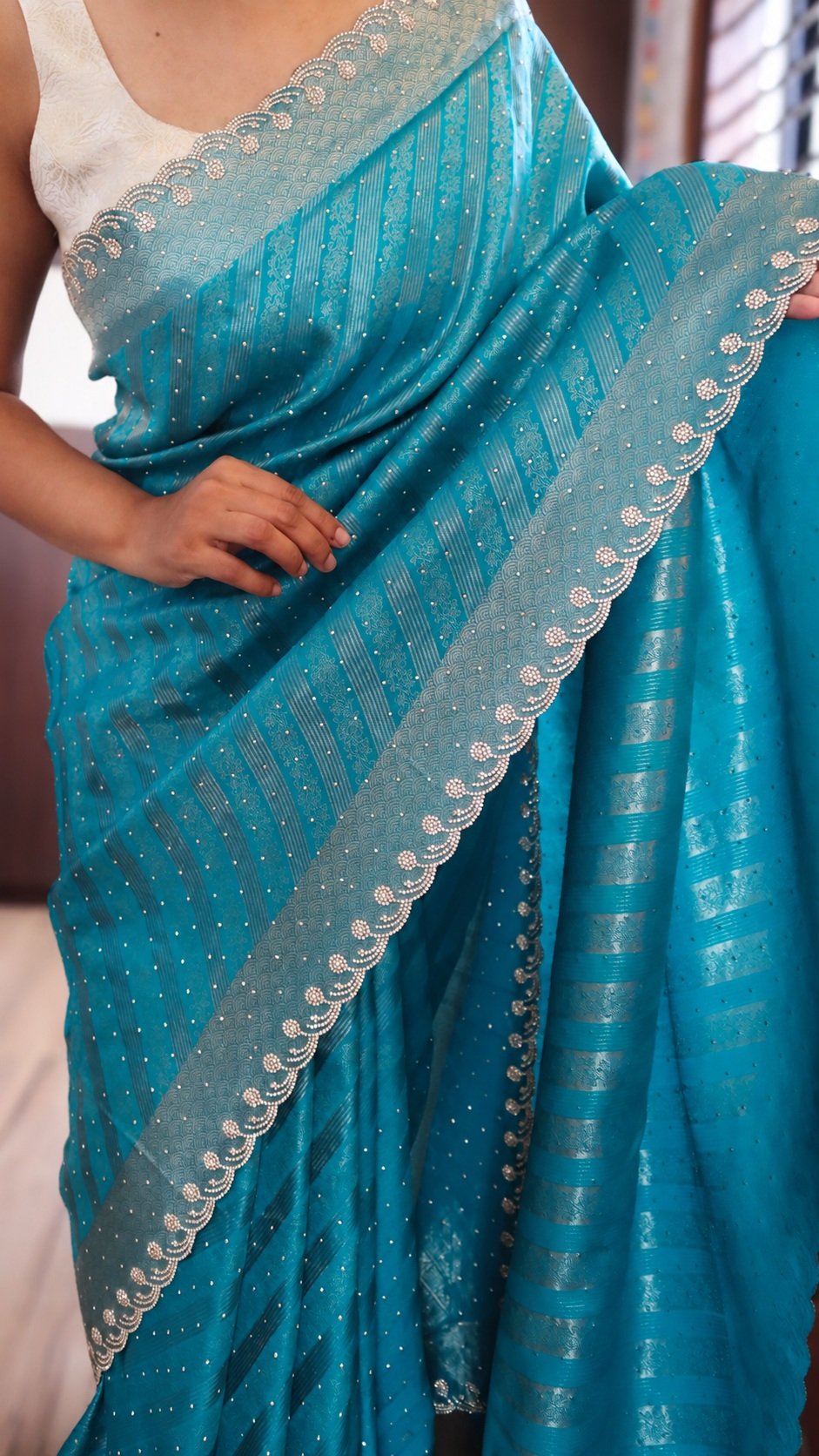 Banarasi Silk Saree with Swarovski Work 4 Banarasi silk saree with Swarovski work – turquoise border detail