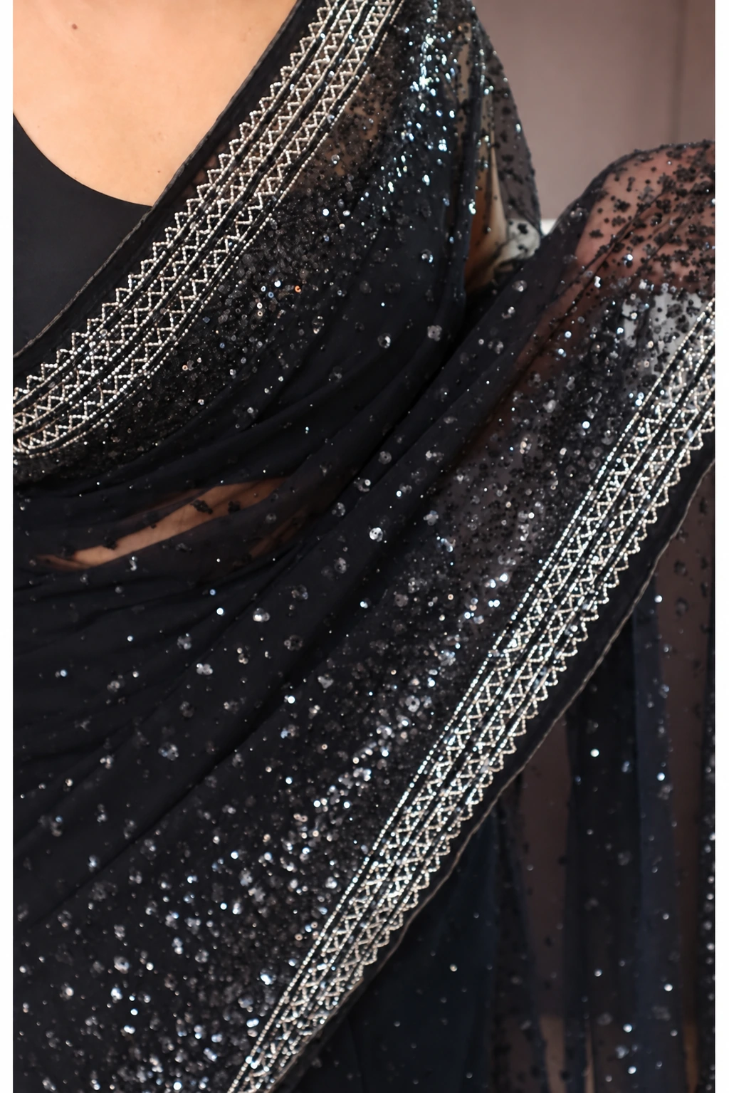 Pure Imported Net Saree with Sequins & Cutdana Handwork 10 Black pure imported net saree with sequins and cutdana hand embroidery – drape