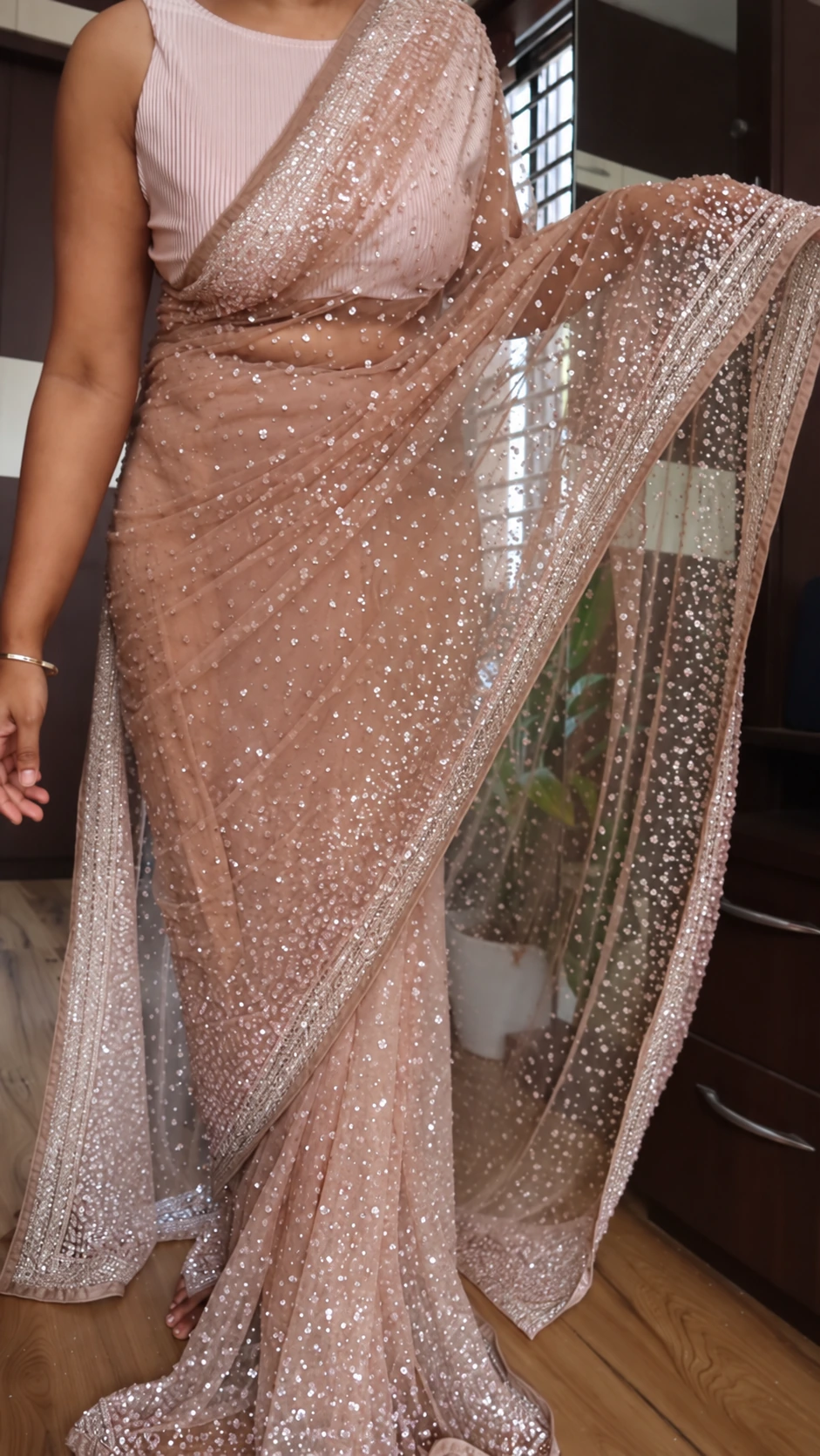 Pure Imported Net Saree with Sequins & Cutdana Handwork 1 Champagne Beige pure imported net saree with sequins and cutdana hand embroidery – front view