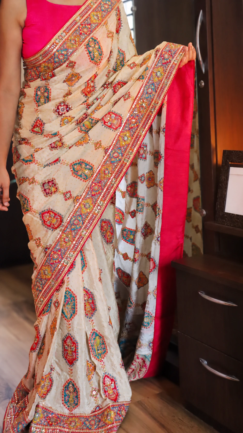 Designer Crepe Satin Saree with Aari Work & Rajasthani Patchwork 1 Cream designer crepe satin saree with Aari work and multicolour Rajasthani patchwork