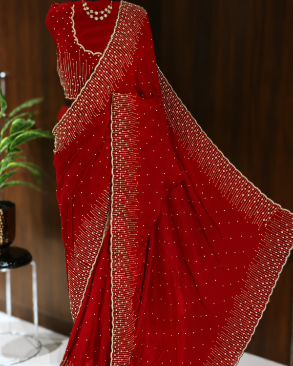 Pure Chinon silk handwork saree in red with grand scalloped sequins cutdana and moti borders