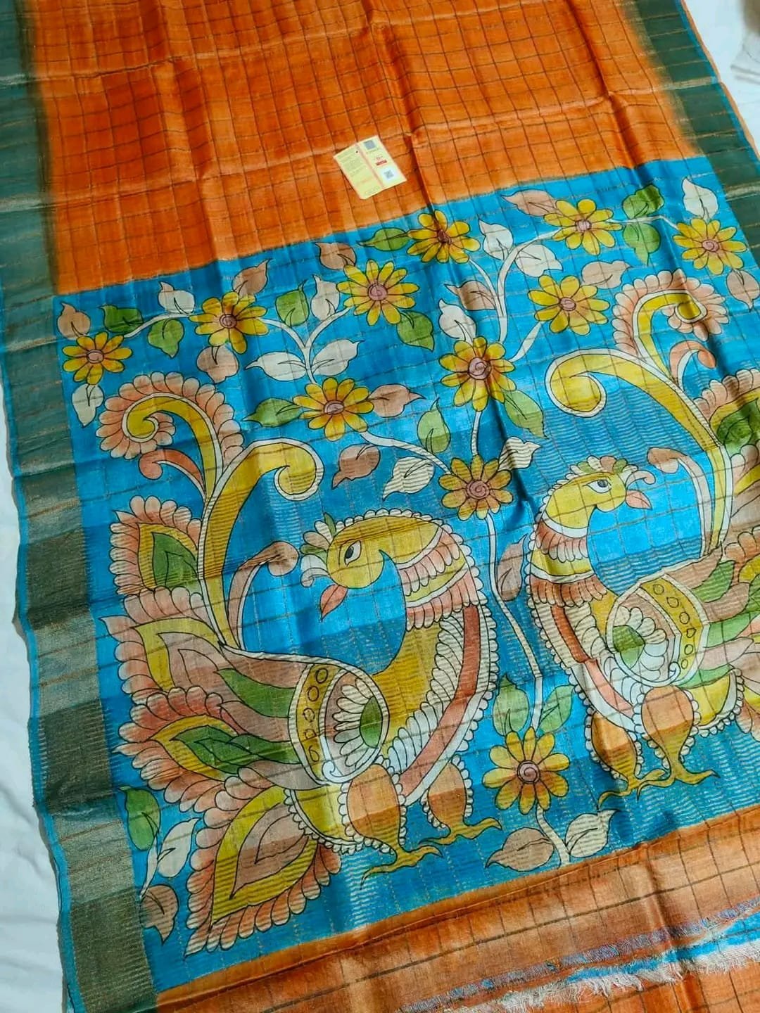 Pure Handloom Tussar Saree with Checks Zari Border and Kalamkari Pallu 3 Pure handloom tussar saree – Orange / Blue Peacock Pallu