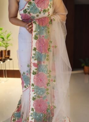 Off White Pure Net Handwork Saree with Floral Appliqué 6 Off white pure net handwork saree with pink and aqua floral applique, full drape