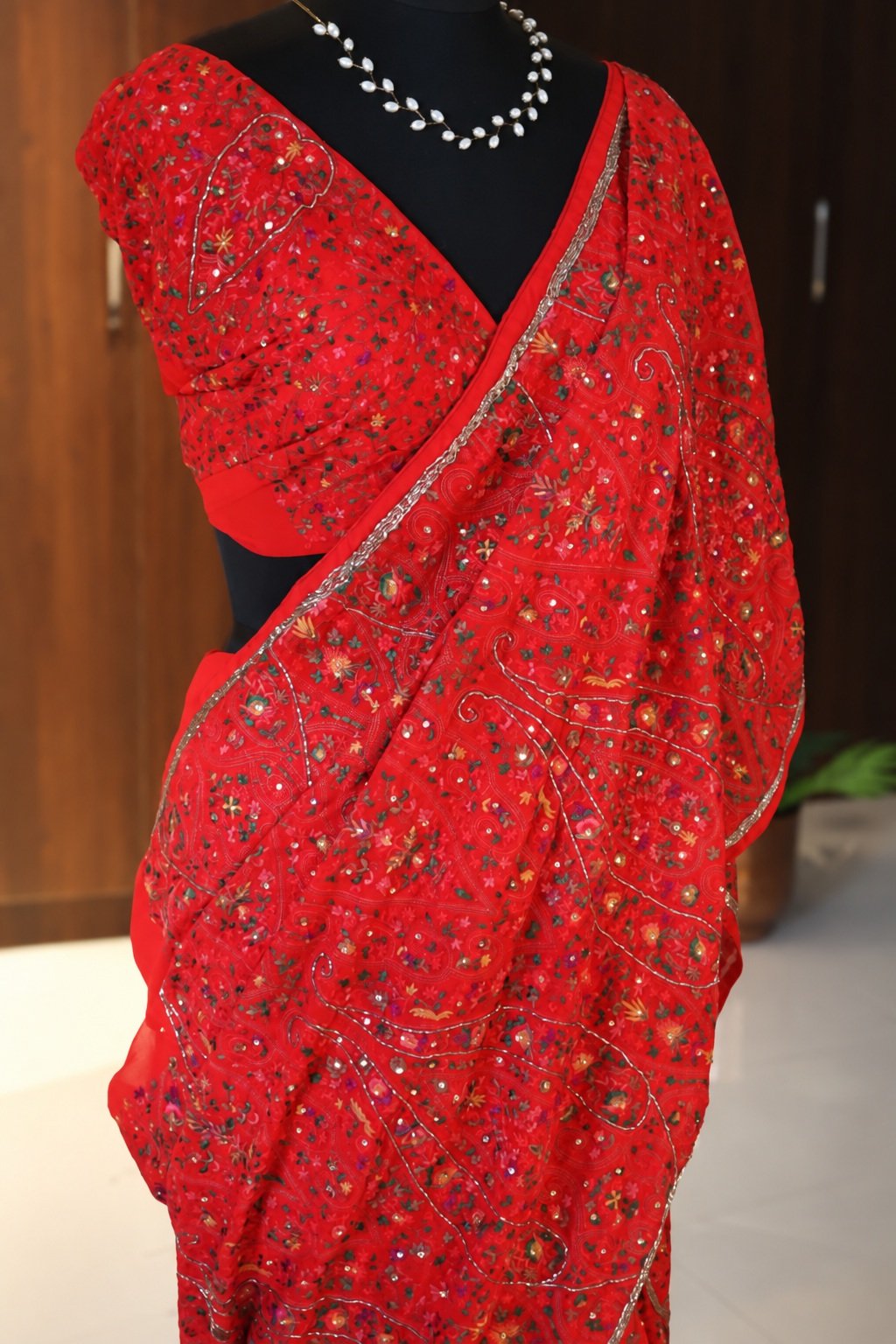 Red Pure Georgette Silk Chikankari Saree 4 Red Pure Georgette Silk Chikankari Saree blouse and embroidery close-up