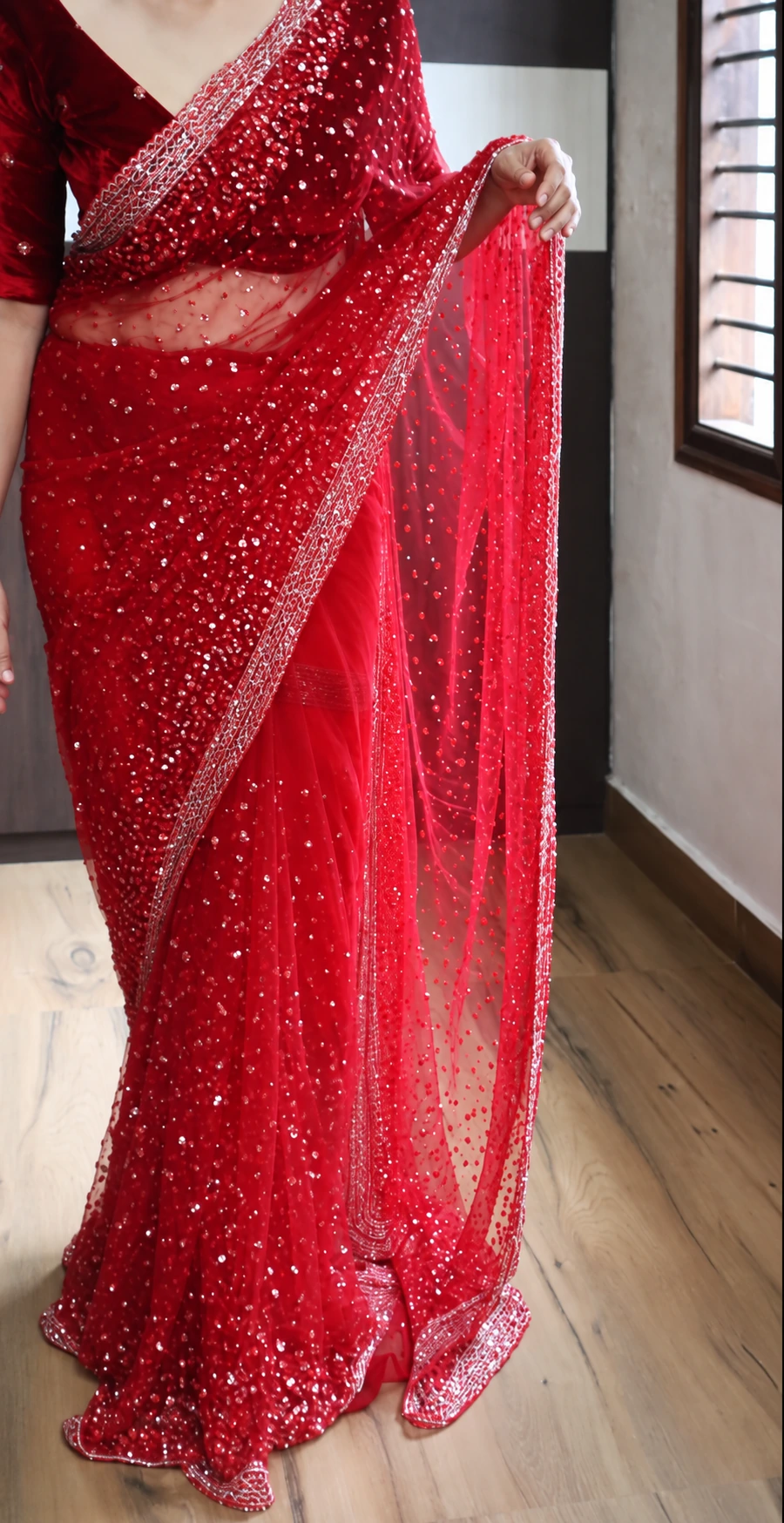 Pure Imported Net Saree with Sequins & Cutdana Handwork 7 Red pure imported net saree with sequins and cutdana hand embroidery – front view