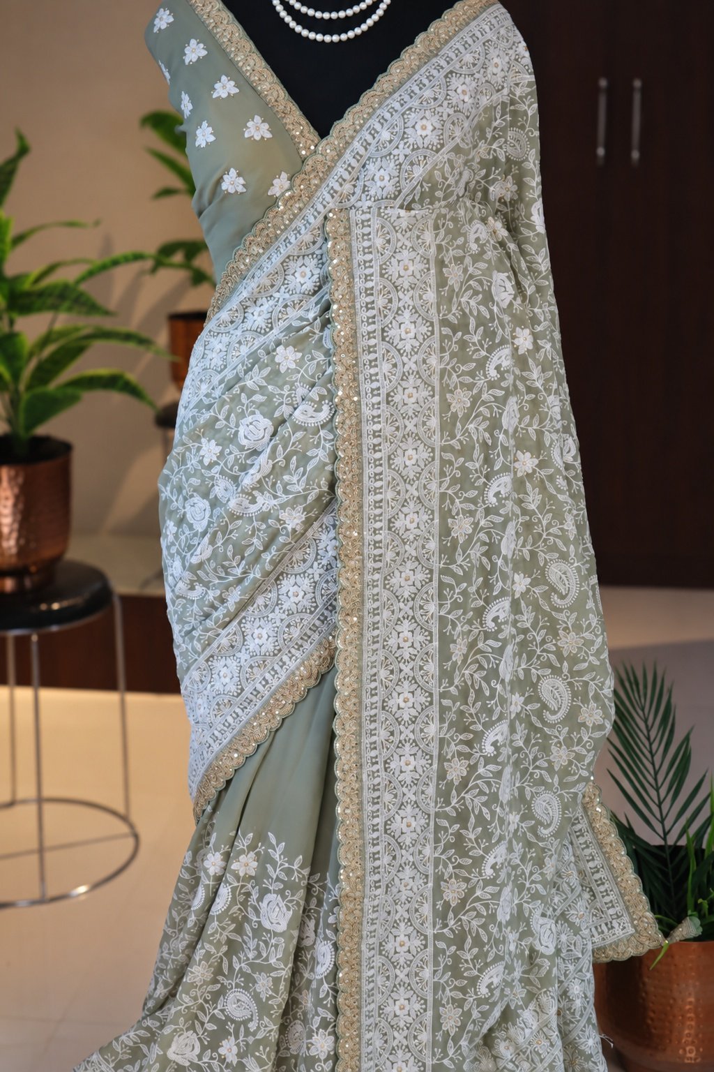 Sage Green Khaddi Georgette Silk Chikankari Saree 4 Sage Green Khaddi Georgette Silk Chikankari Saree embroidery close-up
